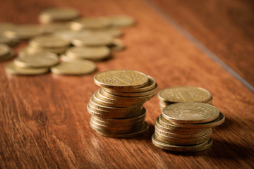 coins on wooden tables on stack 