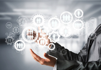 Cogwheels and gears mechanism as social communication concept