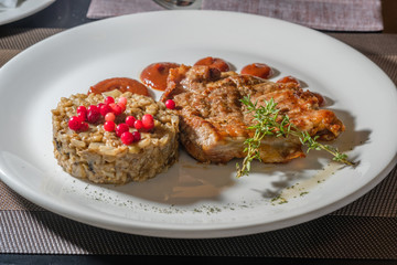 Baked rice and pork steak
