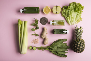 Green vegetables and fruits on pink background. Fresh orhanic detox juice from healthy ingredients....