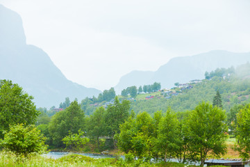 Fototapeta na wymiar Norway foggy mountains landscape.