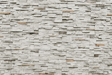 Old grey granite stone wall background texture