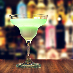 3D rendering a glass of margaritas on a dark bar