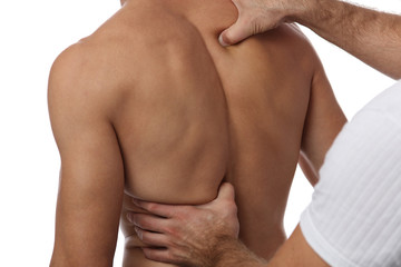 Chiropractic back adjustment. Osteopathy, Alternative medicine, pain relief concept. Physiotherapy,...