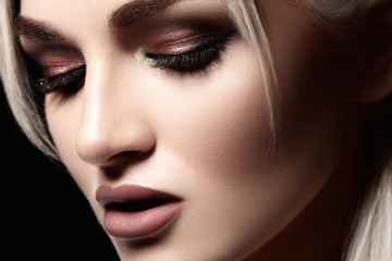 Closeup with of beautiful blond woman. Fashion makeup, clean shiny skin. Makeup and cosmetic. Beauty style on model face