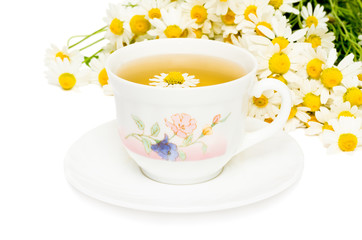 Herbal chamomile tea on a white background
