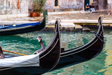 Fototapeta na wymiar Canal with gondolas in Venice, Italy. Tourism concept in Europe.