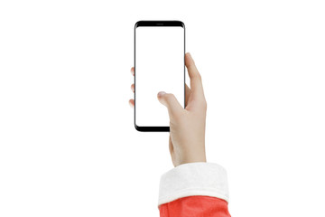 Santa Claus holding black smartphone with rounded edges in hand and touching blank screen, isolated on white background