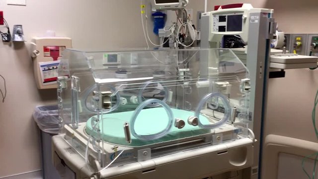 Hospital room with infant isolette