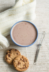Cup of hot cocoa and chocolate chip cookies