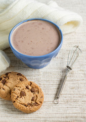 Cup of hot cocoa and chocolate chip cookies