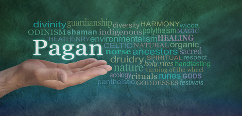 Pagan Word Cloud - Male hand outstretched on a green stone effect background with the word PAGAN floating above surrounded by a relevant word cloud
