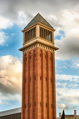 Fototapeta na wymiar One of the Venetian Towers, landmarks in Barcelona, Catalonia, Spain
