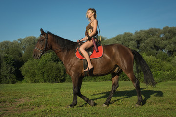 Wild amazon girl on horseback