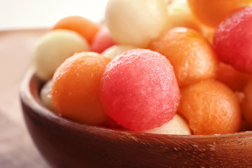 Plate with fresh melon and watermelon balls, closeup