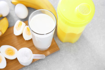 Fototapeta na wymiar Ingredients for protein shake on kitchen table