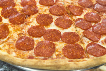 Authentic New York City style Italian pepperoni pizza pie