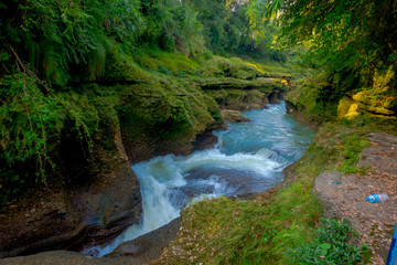 Water flows downstream to Devi's Falls in Pokhara, Nepal