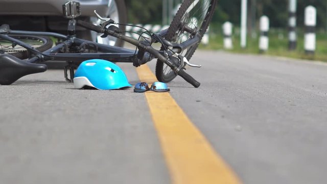 Drunk driving accident , car crash with bicycle on road