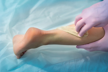Depilation. Depilation of hair on the legs.
