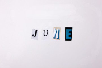 A word writing text showing concept of JUNE made of different magazine newspaper letter for Business case on the white background with copy space