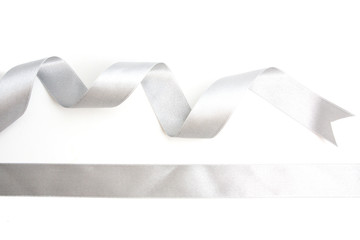 silver ribbon bow in bright silver white grey color isolated