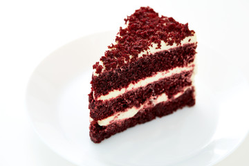 spoon cutting a red dessert
