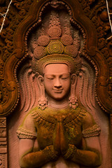 Obraz premium The fairy stucco of Buddhists Brahman and Hindu Outdoor exhibits stain and moss green. 