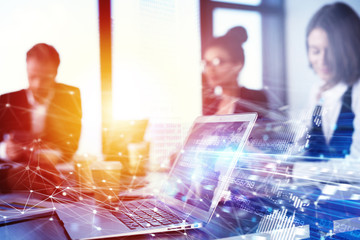 Teamwork works with a laptop. Concept of internet sharing and interconnection. double exposure