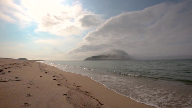 Fog in the sea over Petrova Island, Primorsky Krai