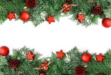 the  Pine leaf with red star and christmas ball decoration on white wooden board with copy space , happy new year and chistmas festival background concept