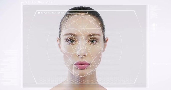 Futuristic and technological scanning of the face of a beautiful woman for facial recognition and scanned person. It can serve to ensure personal safety. Concept of:  future, security, scanning.