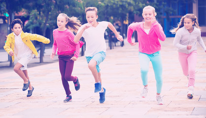 Children jogging in park