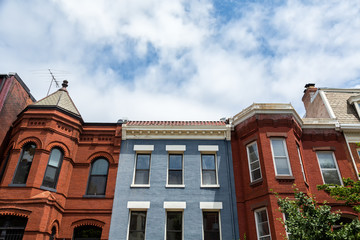 Row houses in the Washington DC neighborhood of Bloomingdale on a summer day.