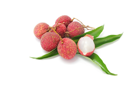 Fresh juicy lychee fruit (Litchi chinensis) with leaves peeled to show the flesh white on white background, Southeast Asia tropical fruit, Sweet and sour taste.