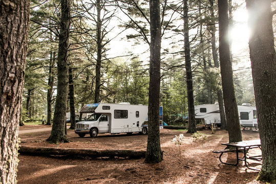 Lake of two rivers Campground Algonquin National Park Beautiful natural forest landscape Canada Parked RV camper car