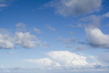 Clouds Against Vibrant Gradient Blue Skies