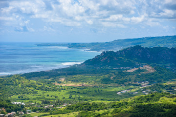 Fototapeta na wymiar View from Cherry Tree Hill to tropical coast of caribbean island Barbados