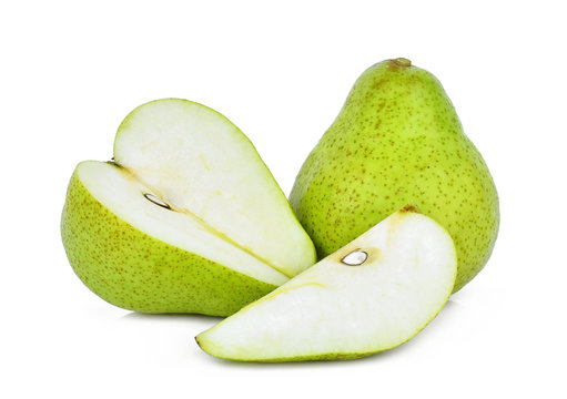 whole and half with slice of green packham pear isolated on white background