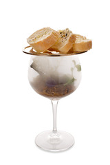 Unusual serving of snacks in a glass, pate with bread and smoke. Molecular modern cuisine vegetable salad. Stock image. Isolated on white.
