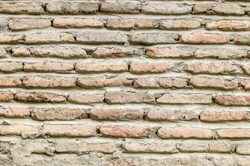 Vintage light brown brick wall texture.