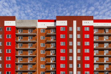 Apartment building under construction. Residential building brightly painted