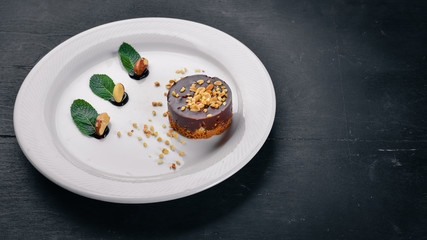 Walnuts and Chocolate Baking. On a wooden surface. Top view. Free space for your text.