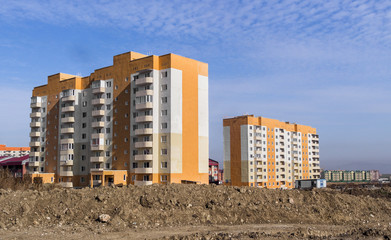 Newly built residential building. Housing estate. Apartment block. New buildings area