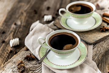 two cups of black coffee