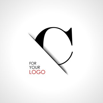 Capital c letter is inserted in the paper slot. To create logos, emblems, monograms.