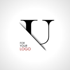 Capital u letter is inserted in the paper slot. To create logos, emblems, monograms. © pgmart