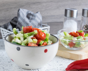 fresh spring vegetable salad with avocado pieces