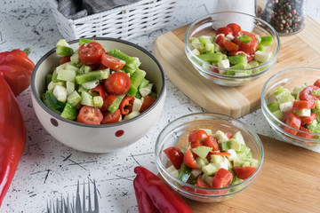 fresh spring vegetable salad with avocado pieces
