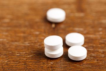 Fototapeta na wymiar Heap of round white pills